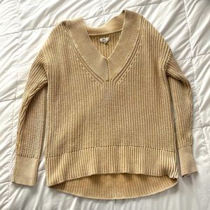 Light yellow/ tan sweater from aerie, the size is xs but it’s a oversized fit